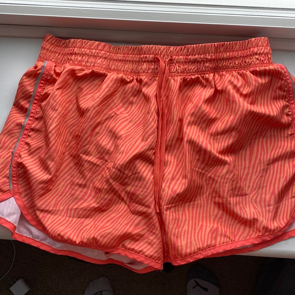 orange printed athletic shorts